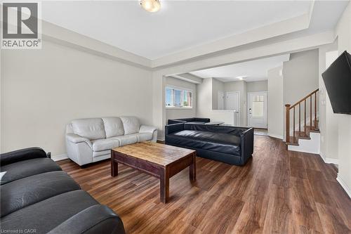 Spacious interior with wood-finish flooring, light-colored walls, and a recessed ceiling light fixture - 9 Winterberry Boulevard, Thorold, ON 
