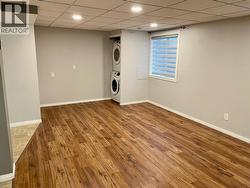 Basement suite - Living room & private laundry - 