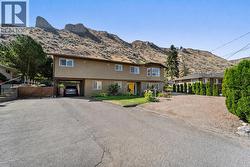 Photo has been edited with AI to show the existing carport. - 