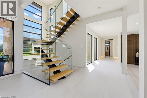 Floating wood treads with glass railing system - 5709 Forth Line, Hillsburg, ON 
