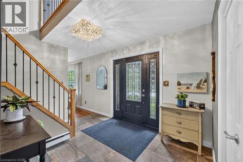 Foyer features slate flooring and upgraded Craftsman staircase - 2023 Latimer Crescent, Greater Sudbury, ON 