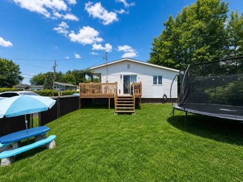 Courtyard - 655 Rue De La Plage, Sainte-Julienne, QC 