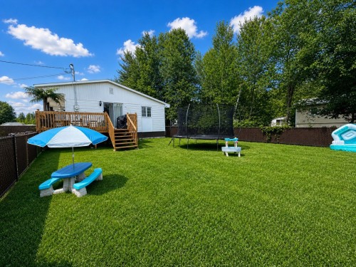 Courtyard - 655 Rue De La Plage, Sainte-Julienne, QC 
