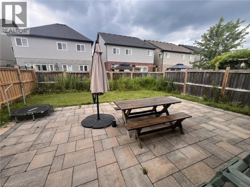 Paved patio area with a multi-tone paver design - 298 Buttonbush Street, Waterloo, ON 