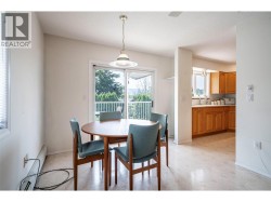 Spacious dining room and doors to balcony - 