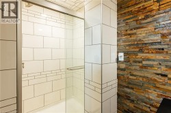 Walk-in shower with clear glass enclosure - 
