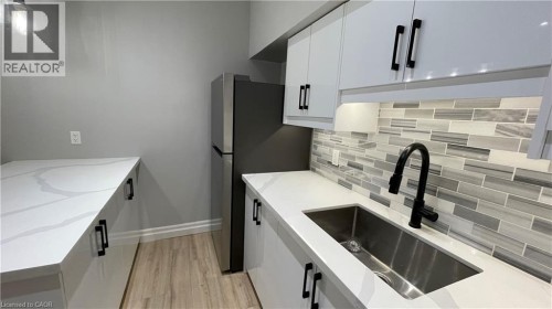 69 EAST MAIN Street Unit# 104 , Welland, Ontario L3B 3W4 4