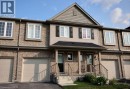 Brick and siding exterior with a peaked roofline - 507 Beaumont Crescent, Kitchener, ON 