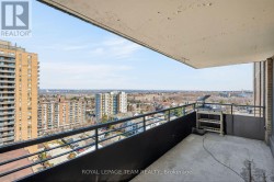 Overlook the city from your spacious balcony. - 