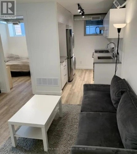 A - 56 JONES AVENUE , Toronto, Ontario M4M 2Z8 3