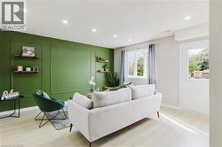 Accent wall with decorative molding and floating shelves - 