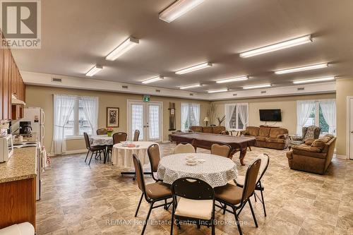 Party room located near the units door access - 102 - 760 Woodhill Drive, Centre Wellington (Fergus), ON 