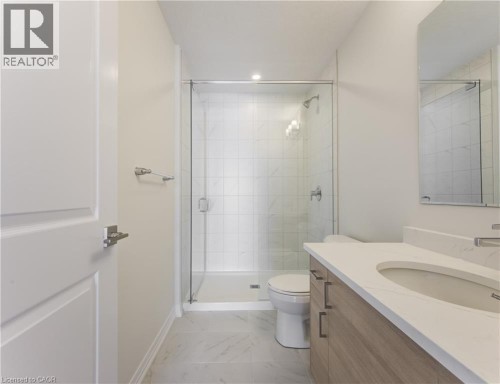 Walk-in shower with clear glass enclosure and tile surround - 25 Urbane Boulevard, Kitchener, ON 