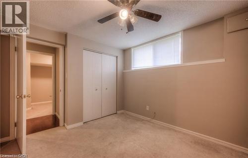 Neutral-toned walls complement the light-colored carpeting - 8 Melran Drive Unit# 2, Cambridge, ON 
