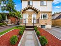 Stone facade with siding accents - 67 Kinzie Avenue, Kitchener, ON 