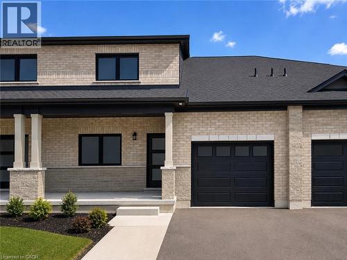 AI-enhanced image for illustration purposes. Depicts an existing Osprey home. Actual home to be built, landscaping, surroundings, colours and finishes may vary. - 66 Robins Place, Simcoe, ON 
