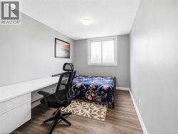 Neutral wall color with wood-finish flooring - 