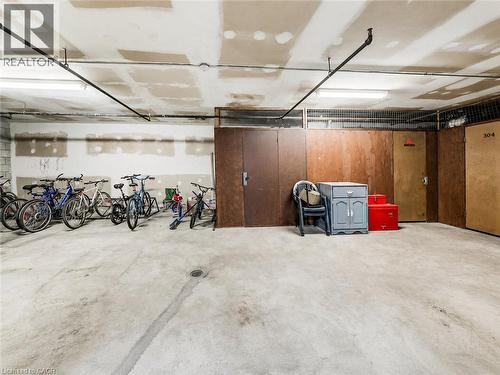 Concrete flooring with a floor drain - 4 Avalon Place Unit# 303, Kitchener, ON 