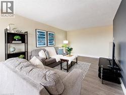 Wood-finish flooring with neutral wall tones - 