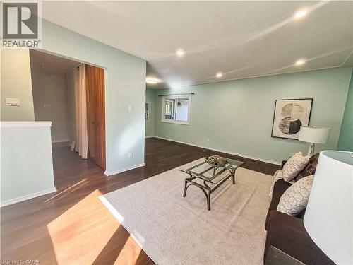 Recessed ceiling lighting, wood-finish flooring, light-toned wall paint, and a window with natural light - 11 Duncairn Avenue, Kitchener, ON 