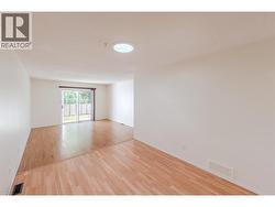 View from kitchen to dining room & living room - 