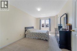 Neutral-toned carpeting paired with light-colored walls - 