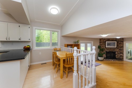 8195 Prince Edward Place, Prince George, BC - Indoor With Fireplace
