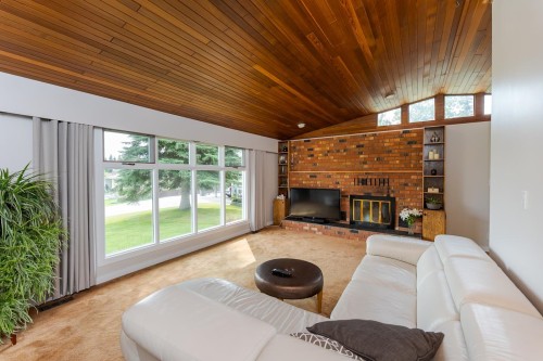 8195 Prince Edward Place, Prince George, BC - Indoor Photo Showing Living Room With Fireplace