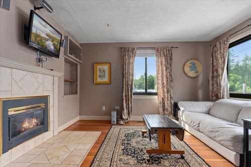 45950 Linzey Road, Cultus Lake, BC - Indoor Photo Showing Living Room With Fireplace