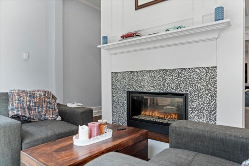 7257 Bryant Place, Chilliwack, BC - Indoor Photo Showing Living Room With Fireplace