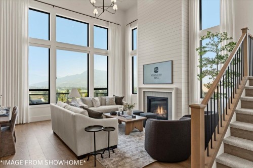 47371 Chartwell Drive, Chilliwack, BC - Indoor Photo Showing Living Room With Fireplace