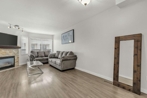 27-45740 Thomas Road, Chilliwack, BC - Indoor Photo Showing Living Room With Fireplace