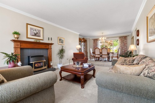 6755 Henry Street, Chilliwack, BC - Indoor Photo Showing Living Room With Fireplace