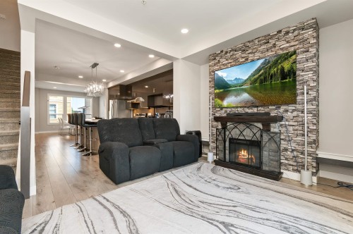 107-8413 Midtown Way, Chilliwack, BC - Indoor Photo Showing Living Room With Fireplace