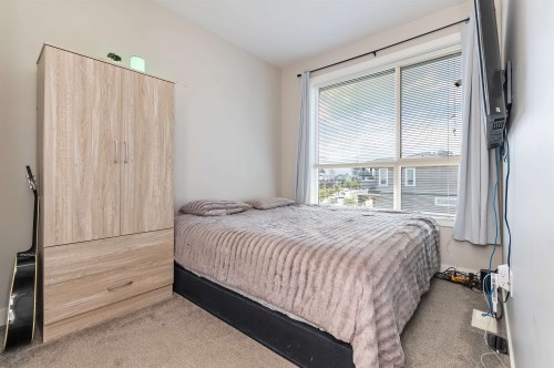 107-8413 Midtown Way, Chilliwack, BC - Indoor Photo Showing Bedroom