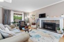 8668 Coventry Place, Chilliwack, BC  - Indoor Photo Showing Living Room With Fireplace 