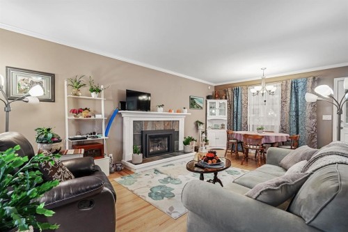 8668 Coventry Place, Chilliwack, BC - Indoor Photo Showing Living Room With Fireplace