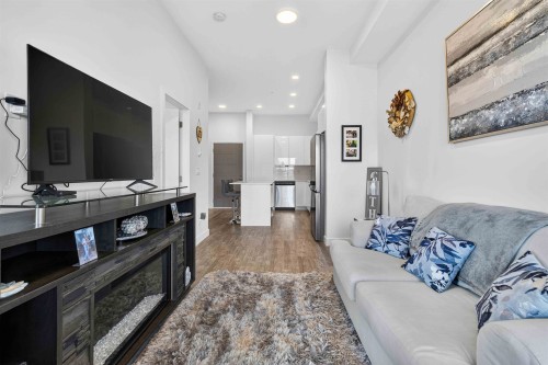 403-9450 Robson Street, Chilliwack, BC - Indoor Photo Showing Living Room With Fireplace