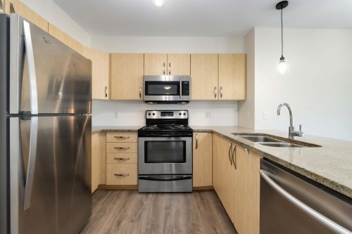 216-13555 Gateway Drive, Surrey, BC 