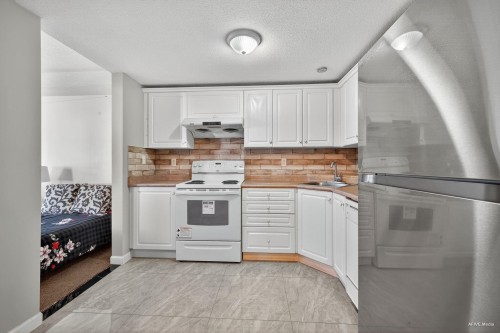 306-13780 76 Avenue, Surrey, BC 