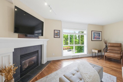 305-15150 29A Avenue, Surrey, BC - Indoor Photo Showing Living Room With Fireplace