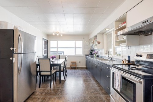 10482 125A Street, Surrey, BC - Indoor Photo Showing Kitchen With Double Sink