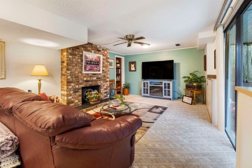 13474 15 Avenue, Surrey, BC - Indoor Photo Showing Living Room With Fireplace