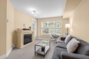 302-30525 Cardinal Avenue, Abbotsford, BC  - Indoor Photo Showing Living Room With Fireplace 