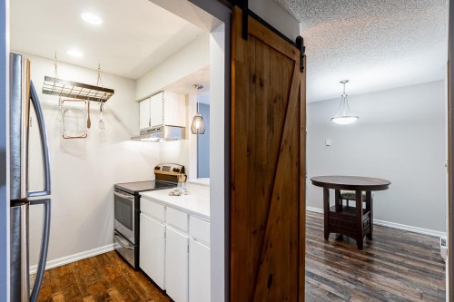 207-17661 58A Avenue, Surrey, BC - Indoor Photo Showing Kitchen With Stainless Steel Kitchen