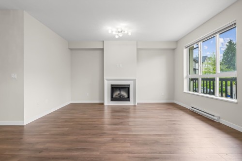 82-10489 Delsom Crescent, Delta, BC - Indoor Photo Showing Living Room With Fireplace