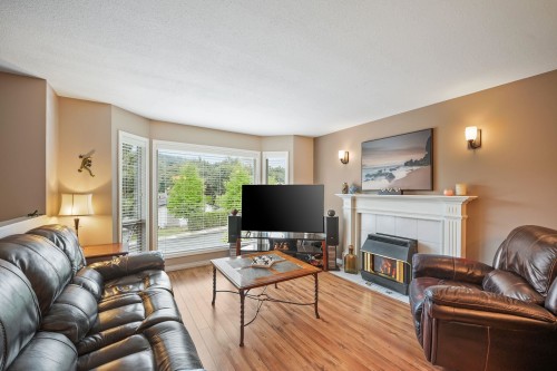 3669 Bulkley Street, Abbotsford, BC - Indoor Photo Showing Living Room With Fireplace