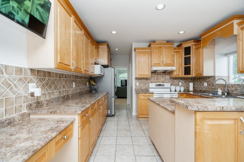 12773 90 Avenue, Surrey, BC - Indoor Photo Showing Kitchen With Double Sink