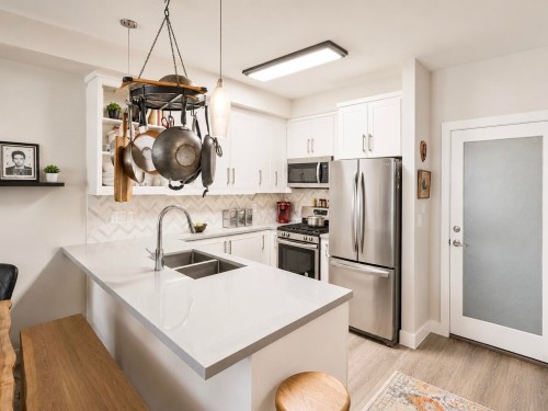 103-14550 Winter Crescent, Surrey, BC - Indoor Photo Showing Kitchen With Double Sink With Upgraded Kitchen