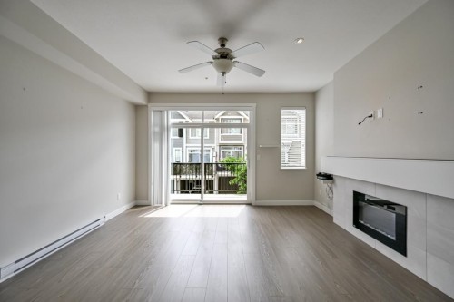 3-7169 208A Street, Langley, BC - Indoor Photo Showing Living Room With Fireplace